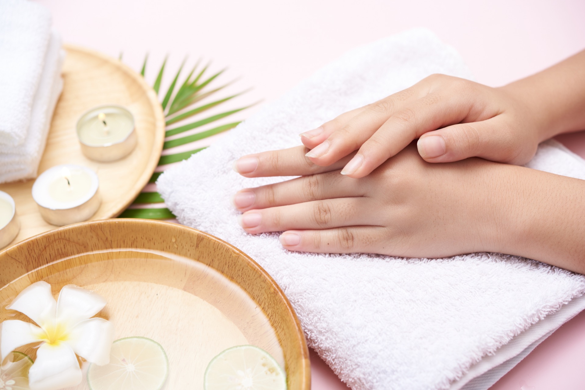 Relaxing hand spa ritual with flowers and perfumed water